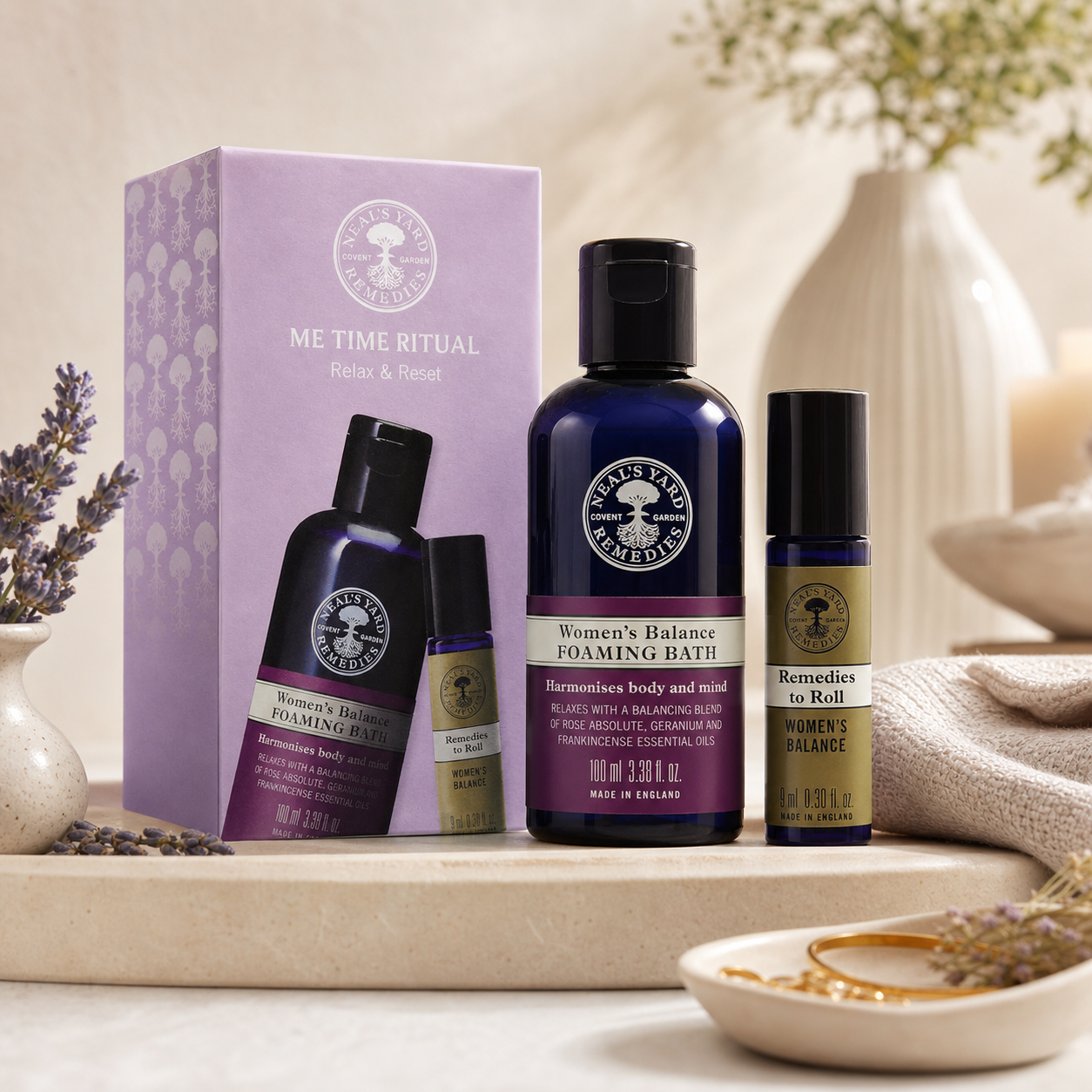 Set of natural skincare products with a lavender theme on a neutral background