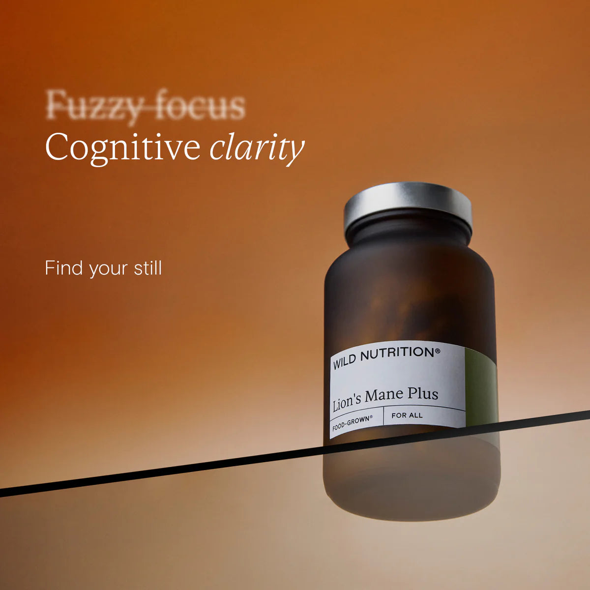 Brown supplement bottle labeled 'Lion's Mane Plus' by 'Wild Nutrition' on a gradient orange background with text about cognitive clarity.